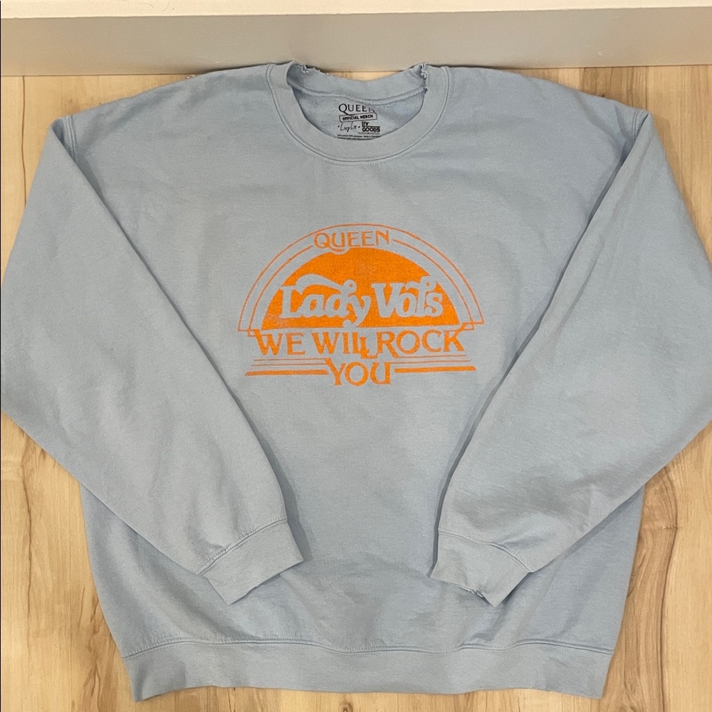 Queen Official Merch Light Blue Lady Vols Sweatshirt with Orange Print Size L